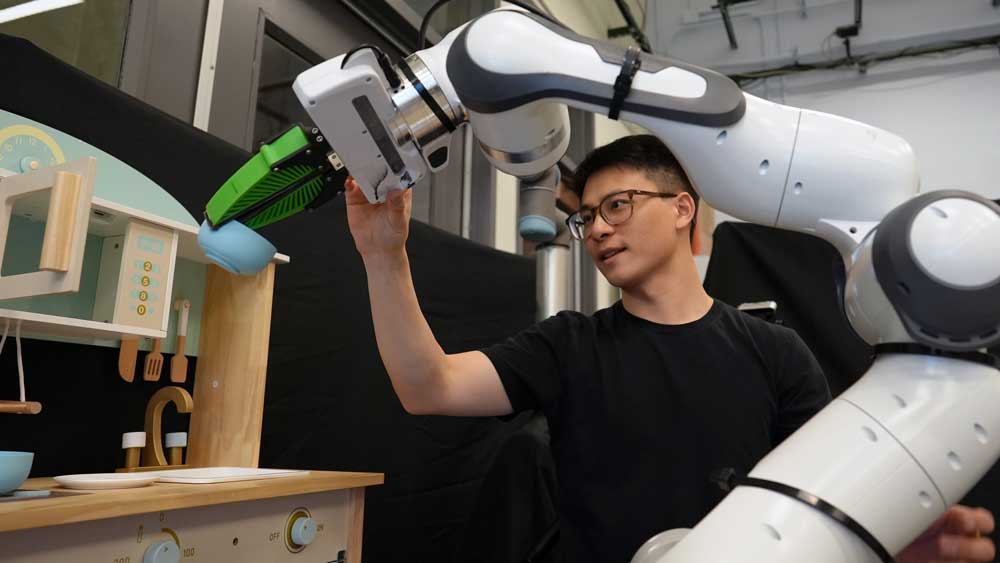 Person working on a robotic arm