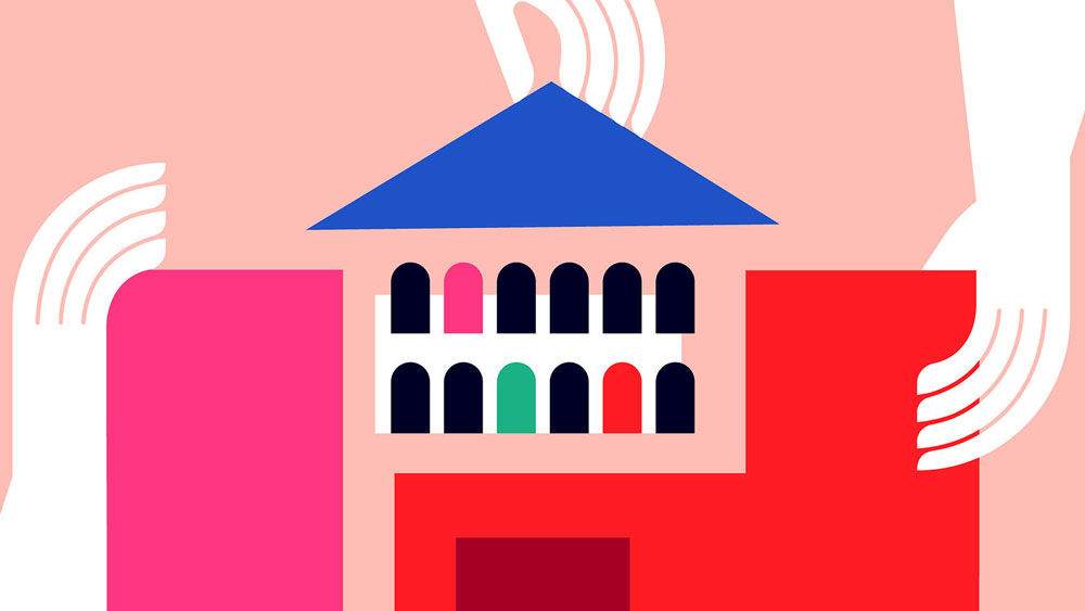 Hands construct a university building