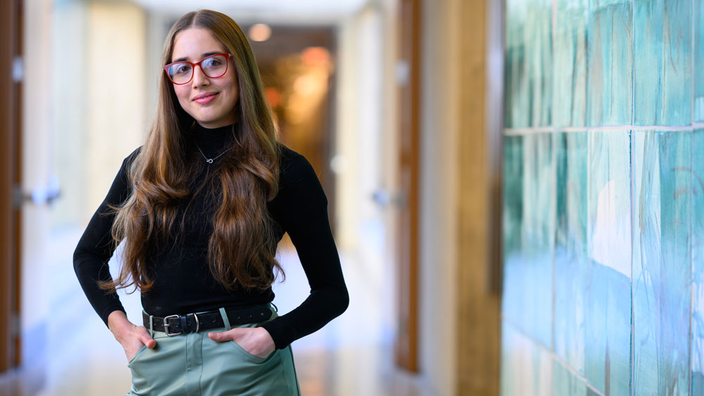 Veronica Sosa stands in MIT hallway