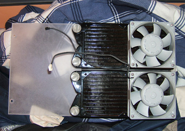 Radiators and fans mounted on a side panel.