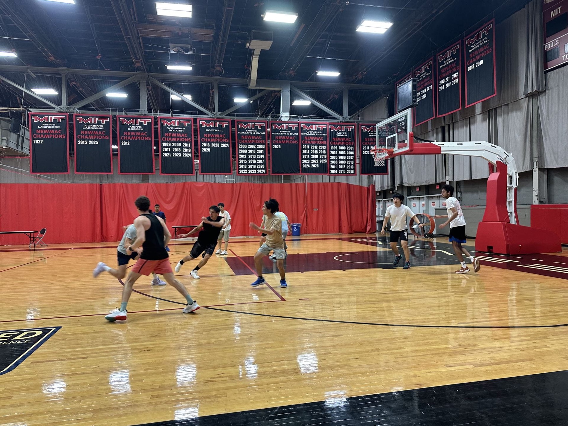 JAM Basketball Club playing in an MIT gym