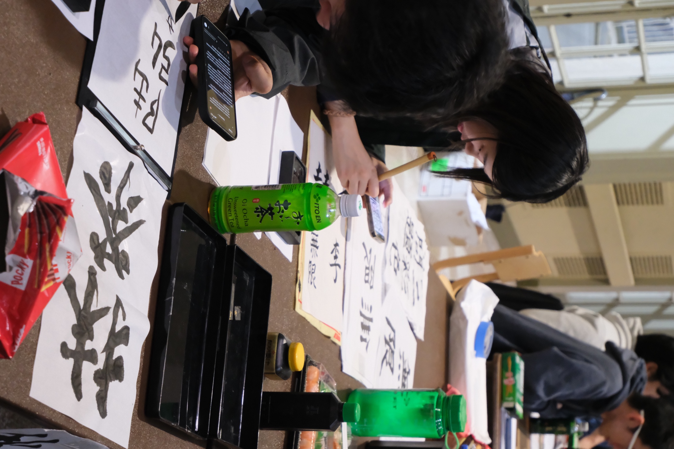 Hanami Festival attendees gathering around cultural activity tables