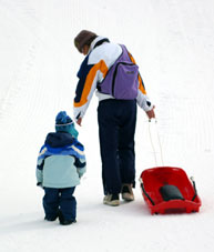 Mom with child and sled
