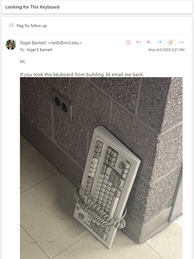 A keyboard attached to a wall
Description automatically generated
