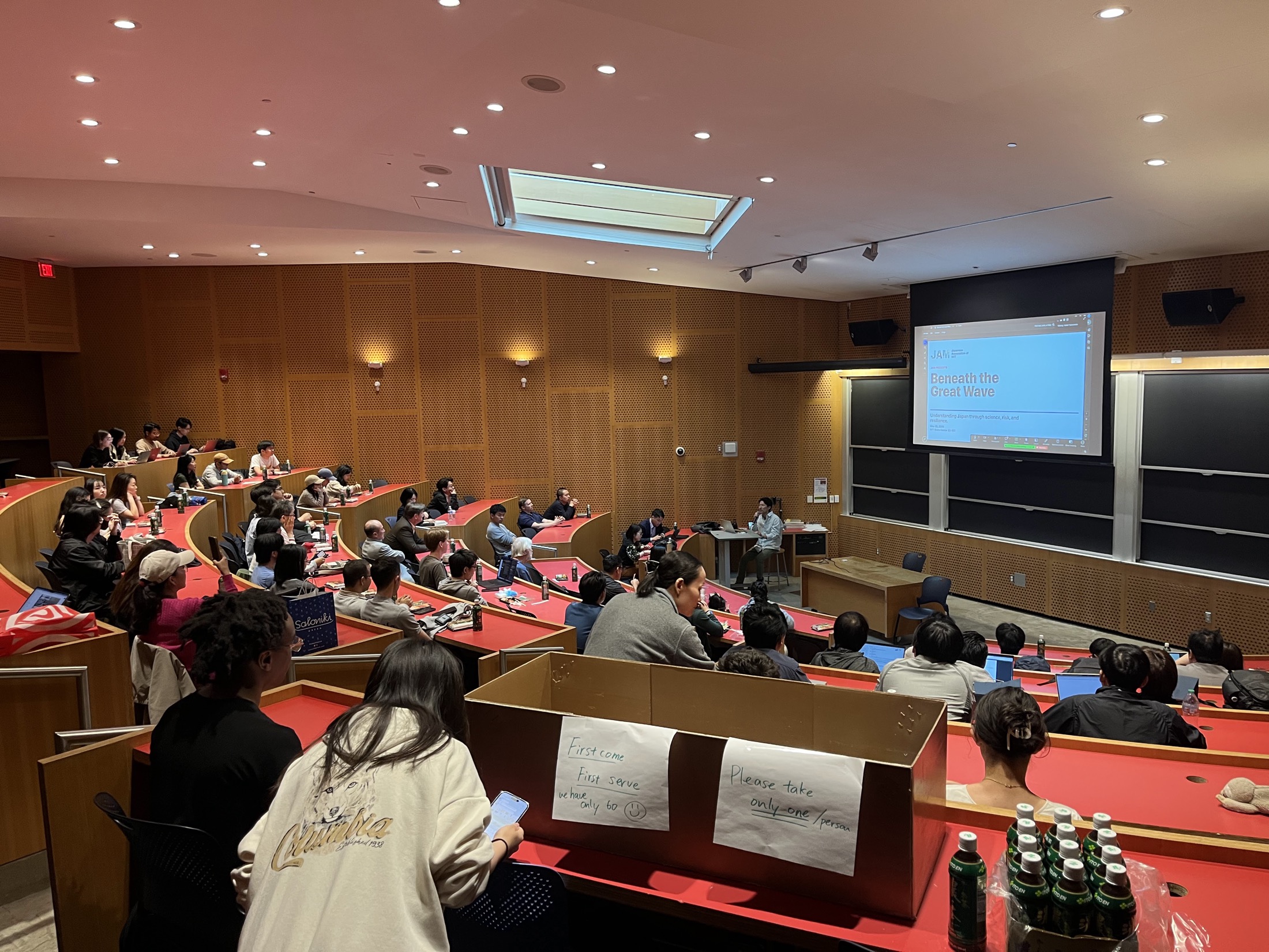 Beneath the Great Wave speakers and attendees at MIT