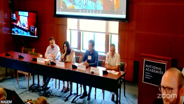 Pat Shafto opens the panel from the moderator's seat at the panel table, National Academies building